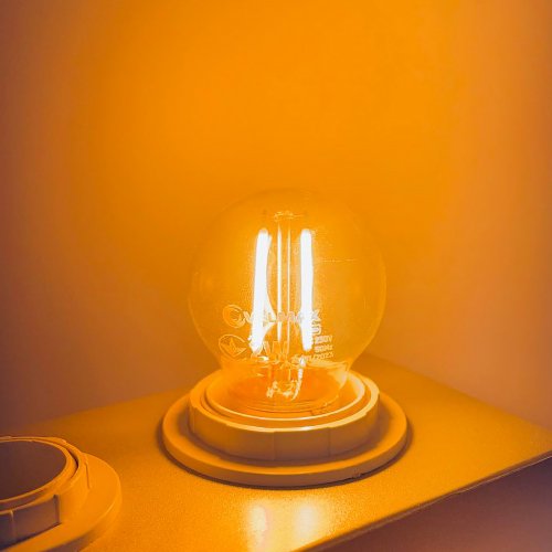 Світлодіодна лампа Velmax V-FILAMENT-G45 2W E27 помаранчева 21-41-35